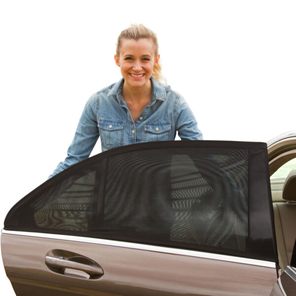 mother smiling in front of newly installed shadesox on family vehicle"